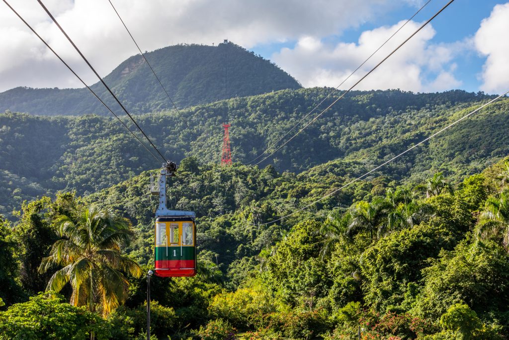 Puerto Plata Teleferico cable car overlooking lush forest and mountain - Leisure Travel Enterprises