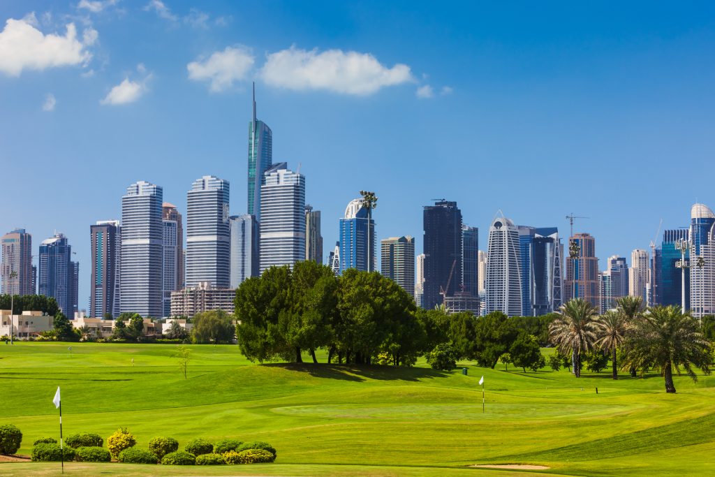 Dubai, United Arab Emirates: Golf Fairway In The Foreground; Modern Skyscrapers Of JLT In The Background - Luxury In Arabia - LTE